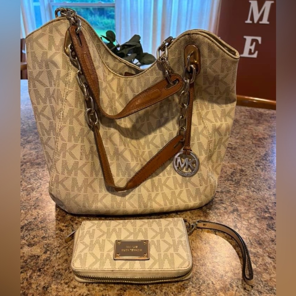 Michael Kors purse and wallet/wristlet set.